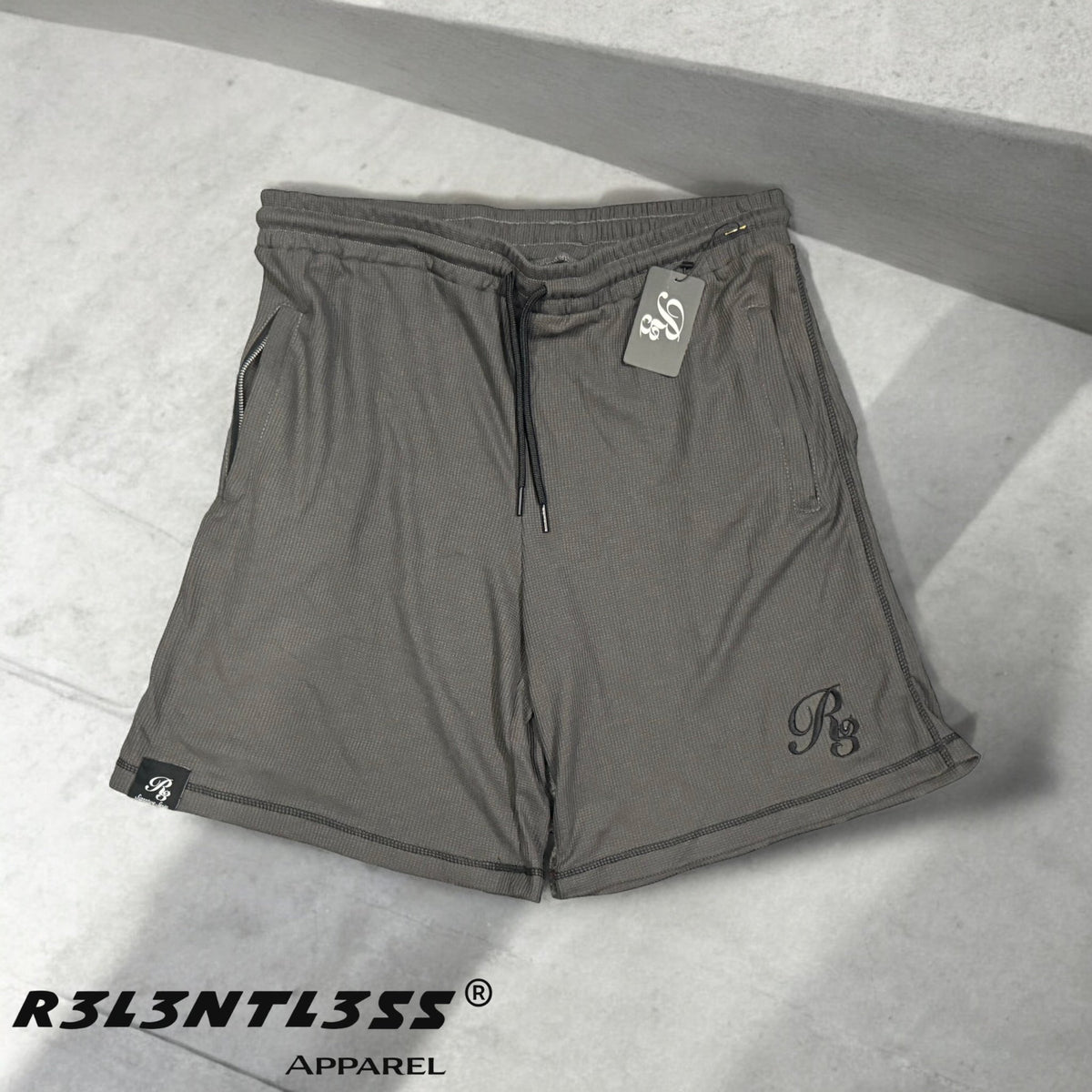 Chosen One Thermal Shorts Charcoal color with zipper pockets Front View