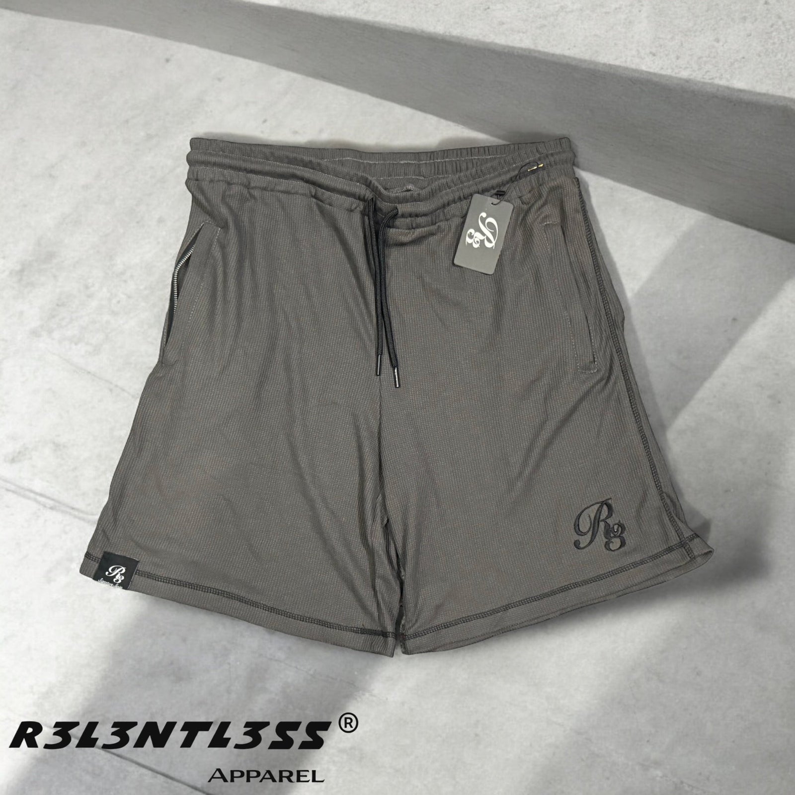 Chosen One Thermal Shorts Charcoal color with zipper pockets Front View